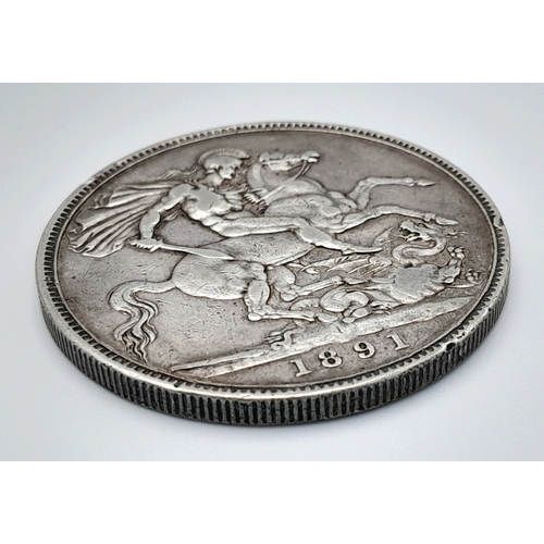 408 - An 1891 Queen Victoria Silver Crown Coin. Good definition.
