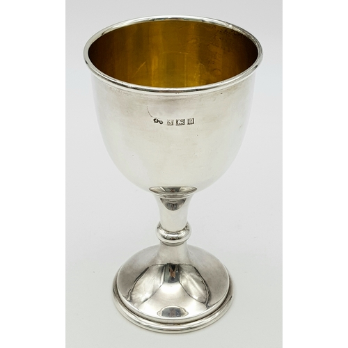 414 - A Vintage Sterling Silver Kiddush Cup. Hallmarks for Birmingham 1957. 13cm tall. 89g.