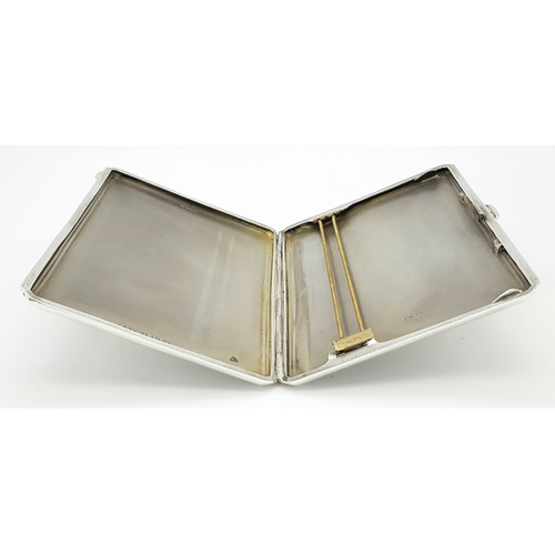 181 - A 1937 Sterling Silver Large Cigarette Case. Machine tooled decoration. In very good condition for i... 