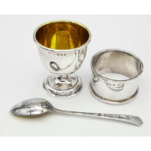 419 - A Vintage Sterling Silver Three Piece Christening Set. Consisting of egg cup, spoon and napkin ring.... 