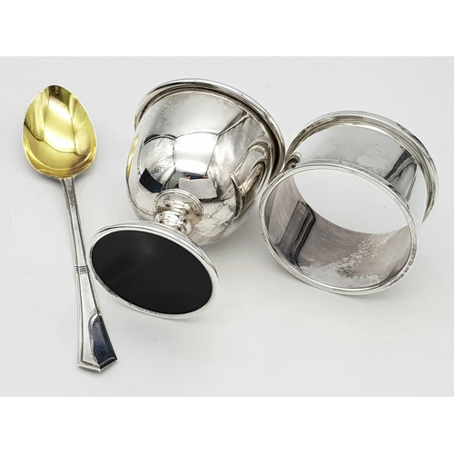 419 - A Vintage Sterling Silver Three Piece Christening Set. Consisting of egg cup, spoon and napkin ring.... 
