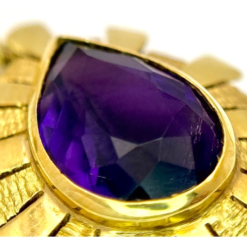 150 - An 18K Yellow Gold, Amethyst Pendant and Ring Set. An oval and pear cut centre stone - 4ctw set in a... 