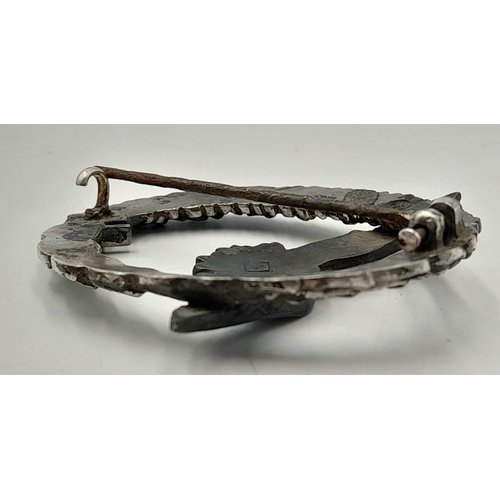 298 - WW2 Luftwaffe Glider Pilots Badge Marked with the No 65 in a diamond on the reverse.