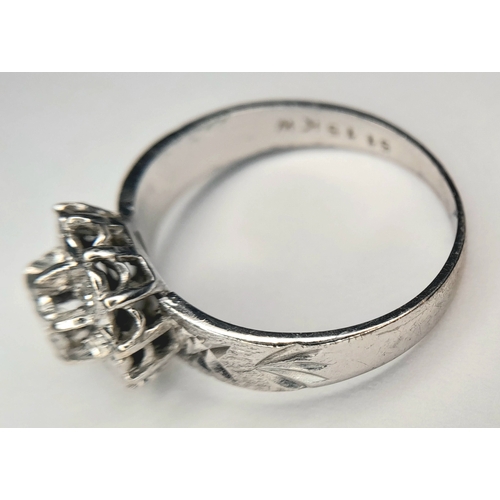 205 - A 18k white gold diamond engraved ring, 0.21ct diamond weight, 4.1g total weight, ring size O. Ref: ... 