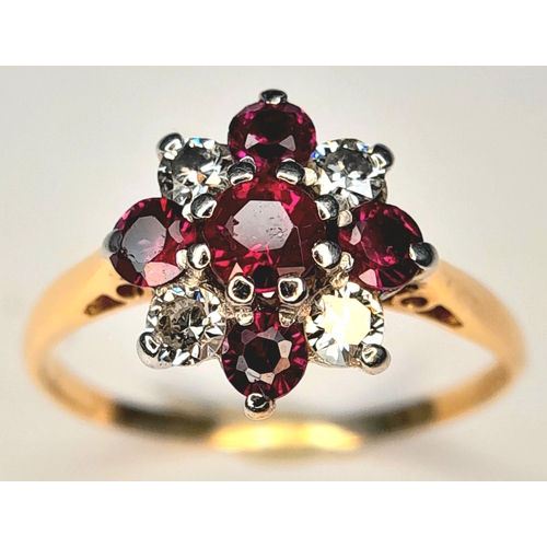 223 - An 18K Yellow Gold And Platinum, Vintage, Diamond And Ruby Set Cluster Ring. 2.1G, Size J. Sc 6052