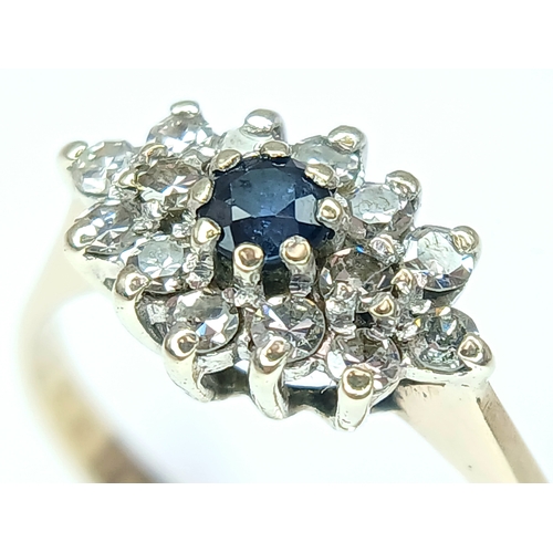 266 - A 9K Yellow Gold, Diamond And Sapphire, Cluster Ring. 2G, Size P. Tan 6003