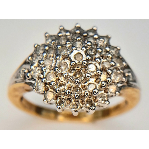 376 - A 9K Yellow Gold, Diamond Set Cluster Ring. 0.25Tcw, 2.7G, Size I. Sc 6005