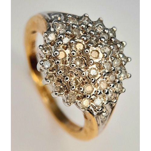 376 - A 9K Yellow Gold, Diamond Set Cluster Ring. 0.25Tcw, 2.7G, Size I. Sc 6005
