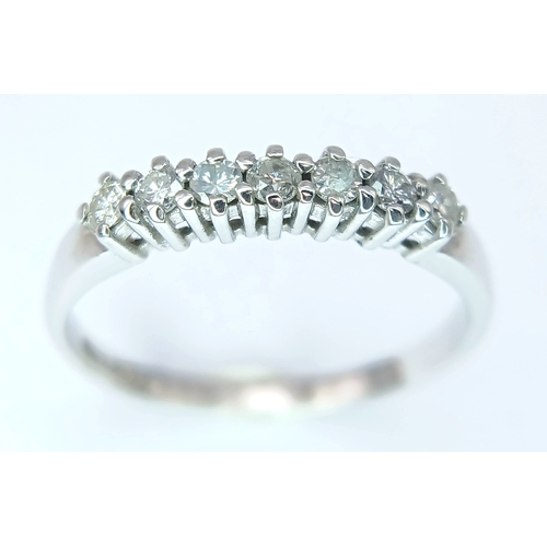 412 - A 9K White Gold, Diamond Set, 7 Stone Ring. 0.15Tcw, 1.5G, Size N. Sc 6012