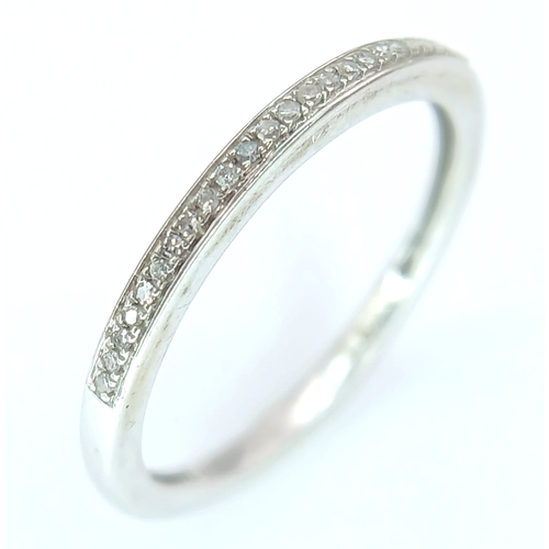 405 - A 9K White Gold, Diamond Set, half Eternity Ring. 1.6G, Size O. Sc 6011