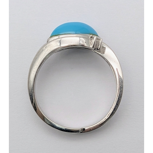233 - A 18k white gold diamond and turquoise ring, 0.02ct diamond weight, 6.7g total weight, ring size R. ... 