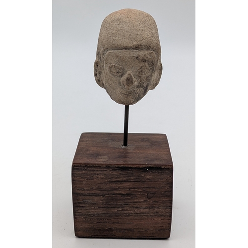 368 - A Rare Antique Mayan (Pre-Columbian) Stone Head Figure Mounted on Wooden Plinth. 11cm Tall. The head... 