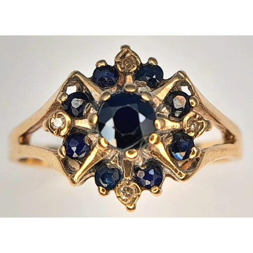 382 - An Elegant Vintage, Hallmarked 1980, 9K Gold Blue Sapphire and Diamond Set Ring - Size O. The Ring i... 