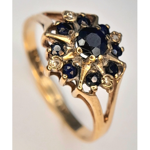 382 - An Elegant Vintage, Hallmarked 1980, 9K Gold Blue Sapphire and Diamond Set Ring - Size O. The Ring i... 