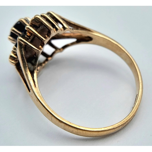 382 - An Elegant Vintage, Hallmarked 1980, 9K Gold Blue Sapphire and Diamond Set Ring - Size O. The Ring i... 