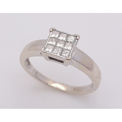 202 - An 18K White Gold, Diamond Set, Cluster Ring. 0.25Tcw, 2.9G, Size J. Sc 6046