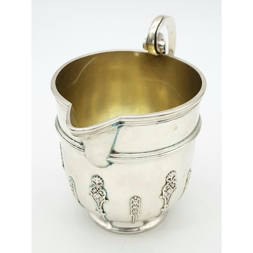 222 - A NORMAN STYLE SOLID SILVER CREAMER HALLMARKED 1898 LONDON .    226.2gms    8cms TALL.