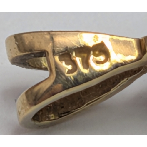 397 - An Elegant 9K Yellow Gold and Emerald Cluster Pendant. 1.5cm Length. Set with Eight 2mm Round Cut Em... 