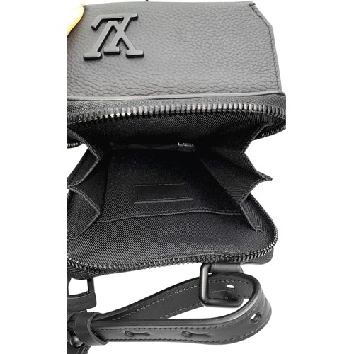 199 - A Black Louis Vuitton Outdoor Pouch Crossbody Bag. Black leather exterior with black hardware, adjus... 