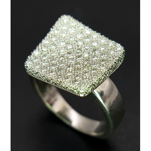 146 - An 18K White Gold, Fancy Diamond Set Ring. 0.50Tcw, 5.6G, Size H. Tan 6015