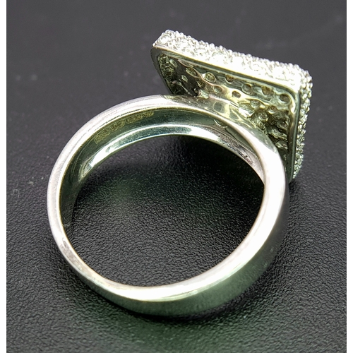 146 - An 18K White Gold, Fancy Diamond Set Ring. 0.50Tcw, 5.6G, Size H. Tan 6015