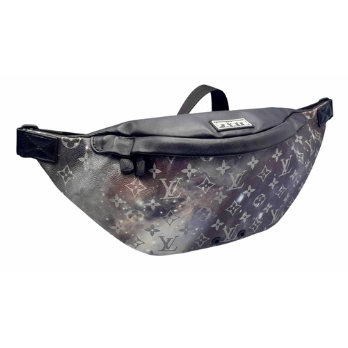 172 - A Louis Vuitton Monogram Galaxy Bumbag. Black and grey monogram coated canvas exterior with black-to... 