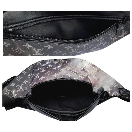 172 - A Louis Vuitton Monogram Galaxy Bumbag. Black and grey monogram coated canvas exterior with black-to... 