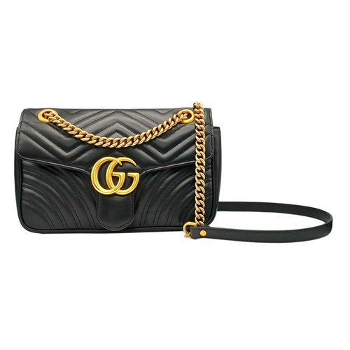 213 - A Black Gucci GG Marmont Matelassé Shoulder Bag. Black leather exterior with gold-toned hardware, ch... 