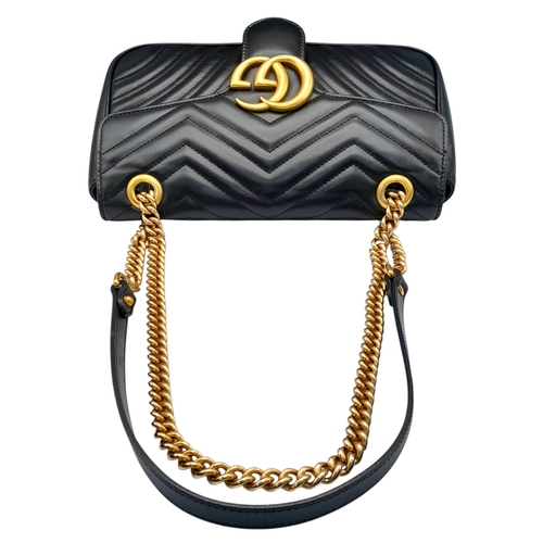 213 - A Black Gucci GG Marmont Matelassé Shoulder Bag. Black leather exterior with gold-toned hardware, ch... 