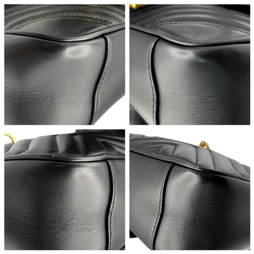 213 - A Black Gucci GG Marmont Matelassé Shoulder Bag. Black leather exterior with gold-toned hardware, ch... 