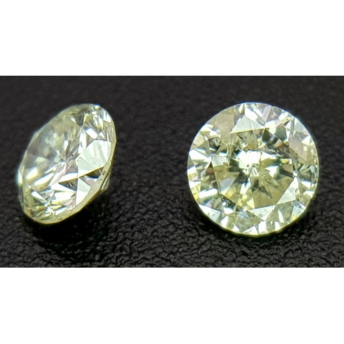 248 - A Pair Of Natural, Round Brilliant Cut Diamonds. 0.56Tcw. Absc 1011