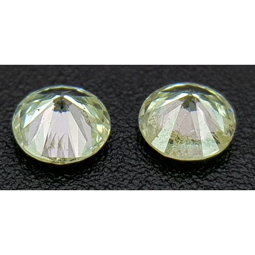 248 - A Pair Of Natural, Round Brilliant Cut Diamonds. 0.56Tcw. Absc 1011