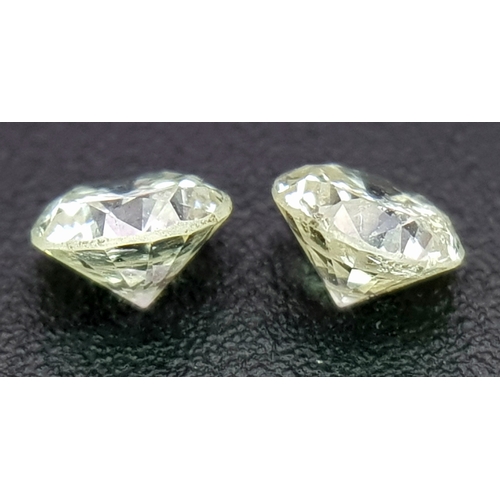 248 - A Pair Of Natural, Round Brilliant Cut Diamonds. 0.56Tcw. Absc 1011