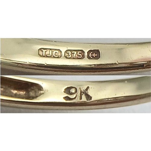 279 - A Wonderful 9 Carat Gold Tanzanite and Diamond Ring Size M. The Ring is set with Eight 5 x 3mm Oval ... 