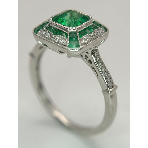 292 - A Head-Turning 950 Platinum, Emerald and Diamond Cocktail Ring. 0.85ctw of Colombian mixed cut emera... 