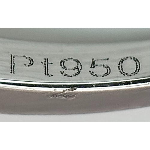 292 - A Head-Turning 950 Platinum, Emerald and Diamond Cocktail Ring. 0.85ctw of Colombian mixed cut emera... 