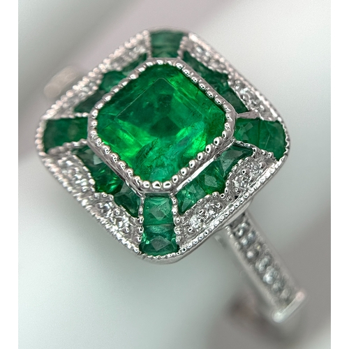 292 - A Head-Turning 950 Platinum, Emerald and Diamond Cocktail Ring. 0.85ctw of Colombian mixed cut emera... 