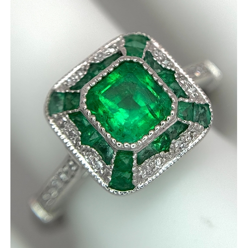 292 - A Head-Turning 950 Platinum, Emerald and Diamond Cocktail Ring. 0.85ctw of Colombian mixed cut emera... 