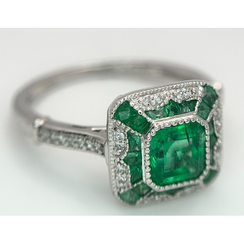 292 - A Head-Turning 950 Platinum, Emerald and Diamond Cocktail Ring. 0.85ctw of Colombian mixed cut emera... 