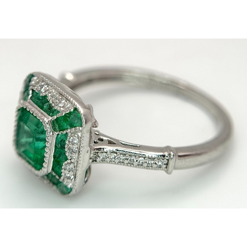 292 - A Head-Turning 950 Platinum, Emerald and Diamond Cocktail Ring. 0.85ctw of Colombian mixed cut emera... 