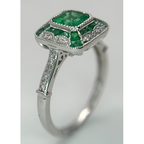 292 - A Head-Turning 950 Platinum, Emerald and Diamond Cocktail Ring. 0.85ctw of Colombian mixed cut emera... 