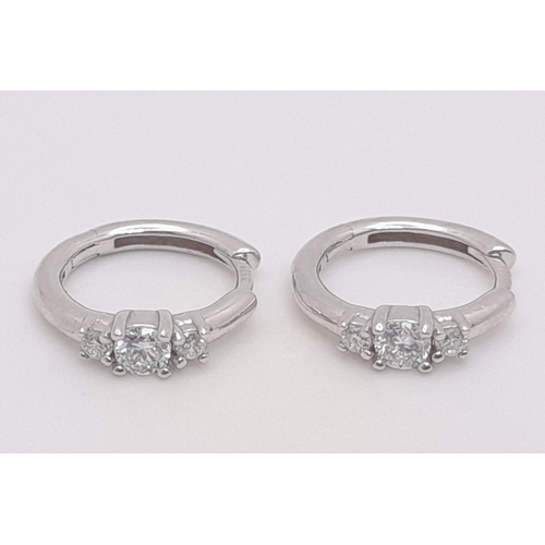 300 - A Pair Of 14K White Gold, Lab Grown Diamond Set, Mini Hoop Earrings. 1.5G. Sc 6030