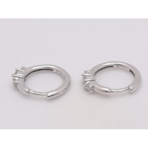 300 - A Pair Of 14K White Gold, Lab Grown Diamond Set, Mini Hoop Earrings. 1.5G. Sc 6030
