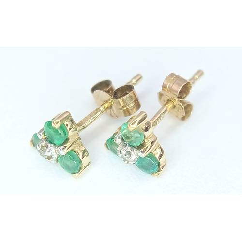 418 - A Pretty Pair of 9K Gold Emerald and Diamond Stud Earrings. 6mm Wide. Set with Three Round Cut Emera... 