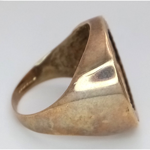 123 - A Classic Half Sovereign Ring. A 1982 Queen Elizabeth II, 22k gold half sovereign coin set in a 9K S... 