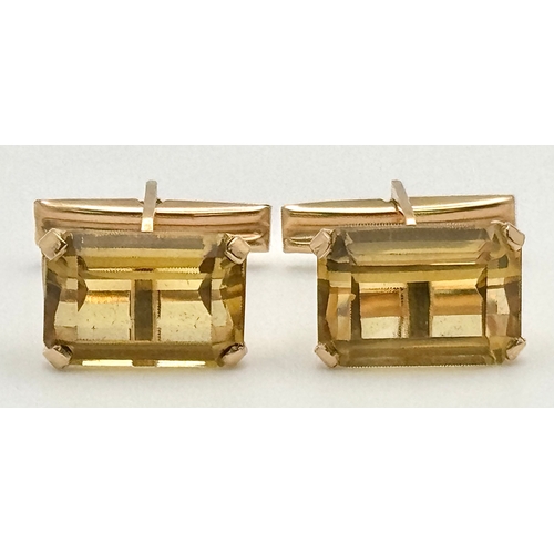 157 - A Pair of 18K Yellow Gold Citrine Cufflinks. Emerald-cut set stones. Circa - 20ctw. 11.5g total weig... 