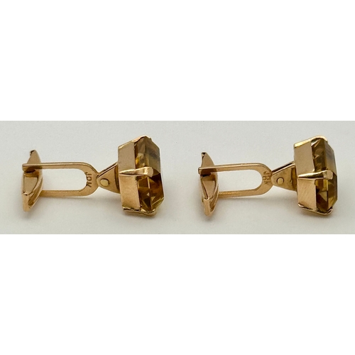 157 - A Pair of 18K Yellow Gold Citrine Cufflinks. Emerald-cut set stones. Circa - 20ctw. 11.5g total weig... 