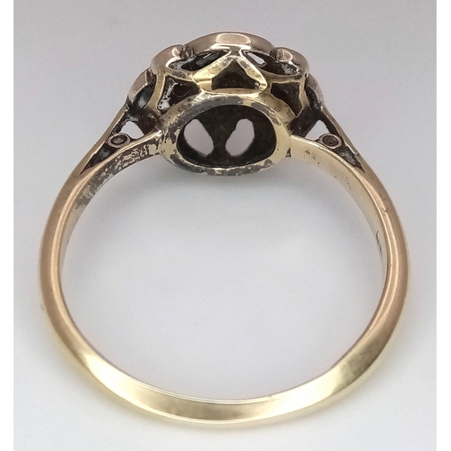 58 - An Antique Edwardian 18K Gold and Platinum Diamond Daisy Cluster Ring. Central diamond surrounded by... 