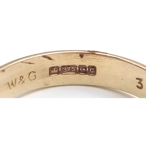 182 - Vintage 9 CARAT GOLD RING. Clear hallmark for Birmingham 1977 . Having Garnet and Zirconia Detail. 2... 