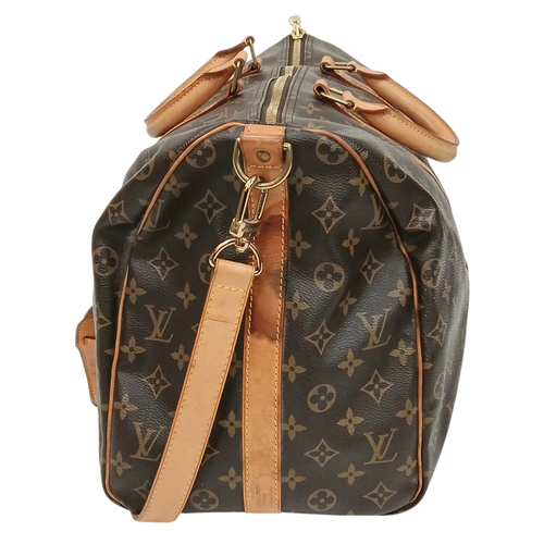 197 - A Brown Louis Vuitton Monogram Keepall 50 Travel Bag. Brown monogram coated canvas exterior with gol... 
